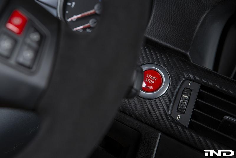 Bouton start-stop rouge adapté au démarrage du moteur BMW Série E
